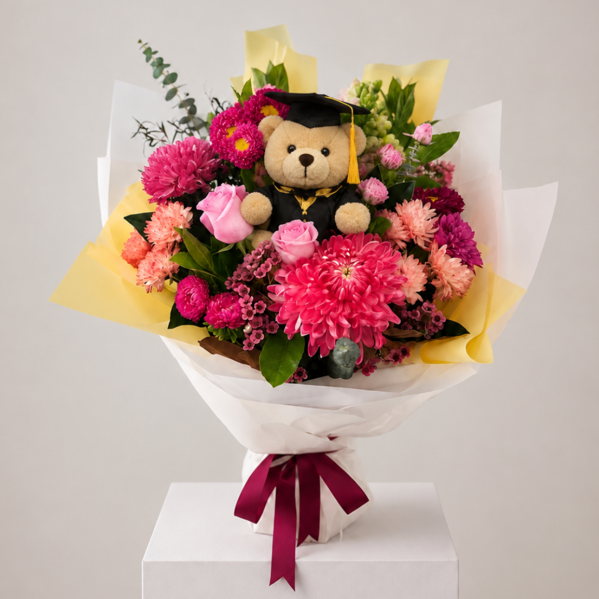 Make their Graduation memorable with bright colourful pink and yellow flowers. Flower delivery Sydney