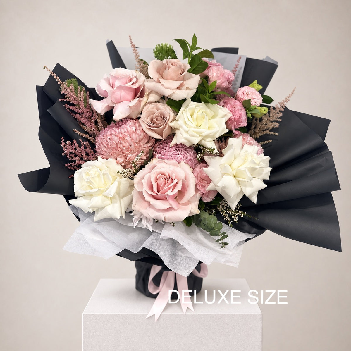 Bouquet of premium white and blush roses and delicate seasonal blooms, this arrangement blends timeless beauty with modern luxury. Flower delivery across Castle Hill, Ryde and Parramatta. 