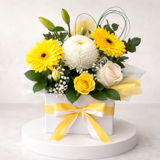 Bright yellow gerbera flower box perfect for birthdays and celebrations. Same day flower delivery Hills District, Parramatta, North Shore and Sydney wide.
