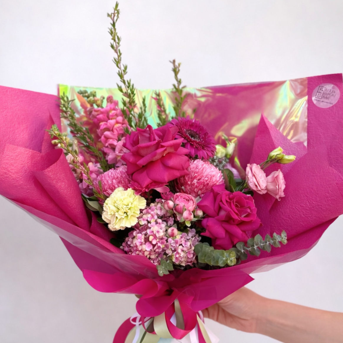 Bright pink bouquet with pink roses and chrysanthemums. Carlingford and Castle Hill Sydney flower delivery