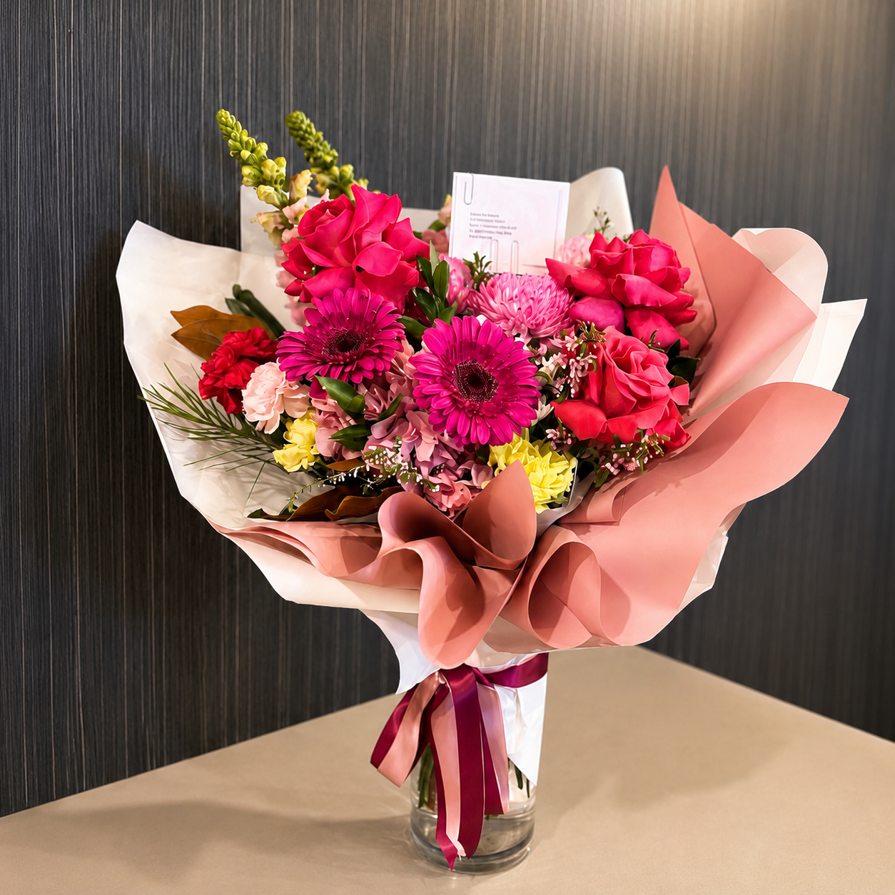 Bright pink bouquet with pink roses and chrysanthemums. Carlingford and Castle Hill Sydney flower delivery