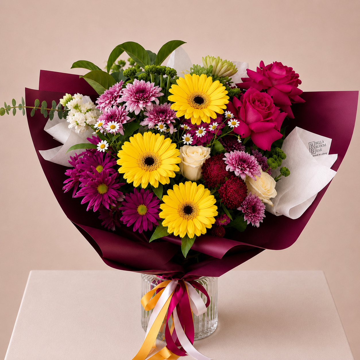 Large bright bouquet of beautiful yellow blooms, roses and chrysanthemums wrapped in luxe plum paper by Bella Bloom Bar, same-day florist in West Pennant Hills | Hills District.