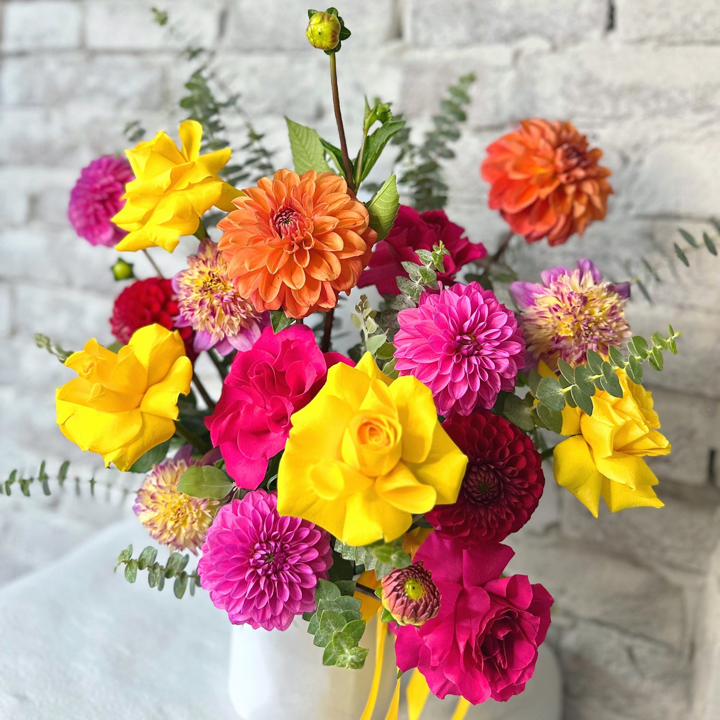 Vibrant seasonal fresh flowers and rose flower basket same day delivery Sydney